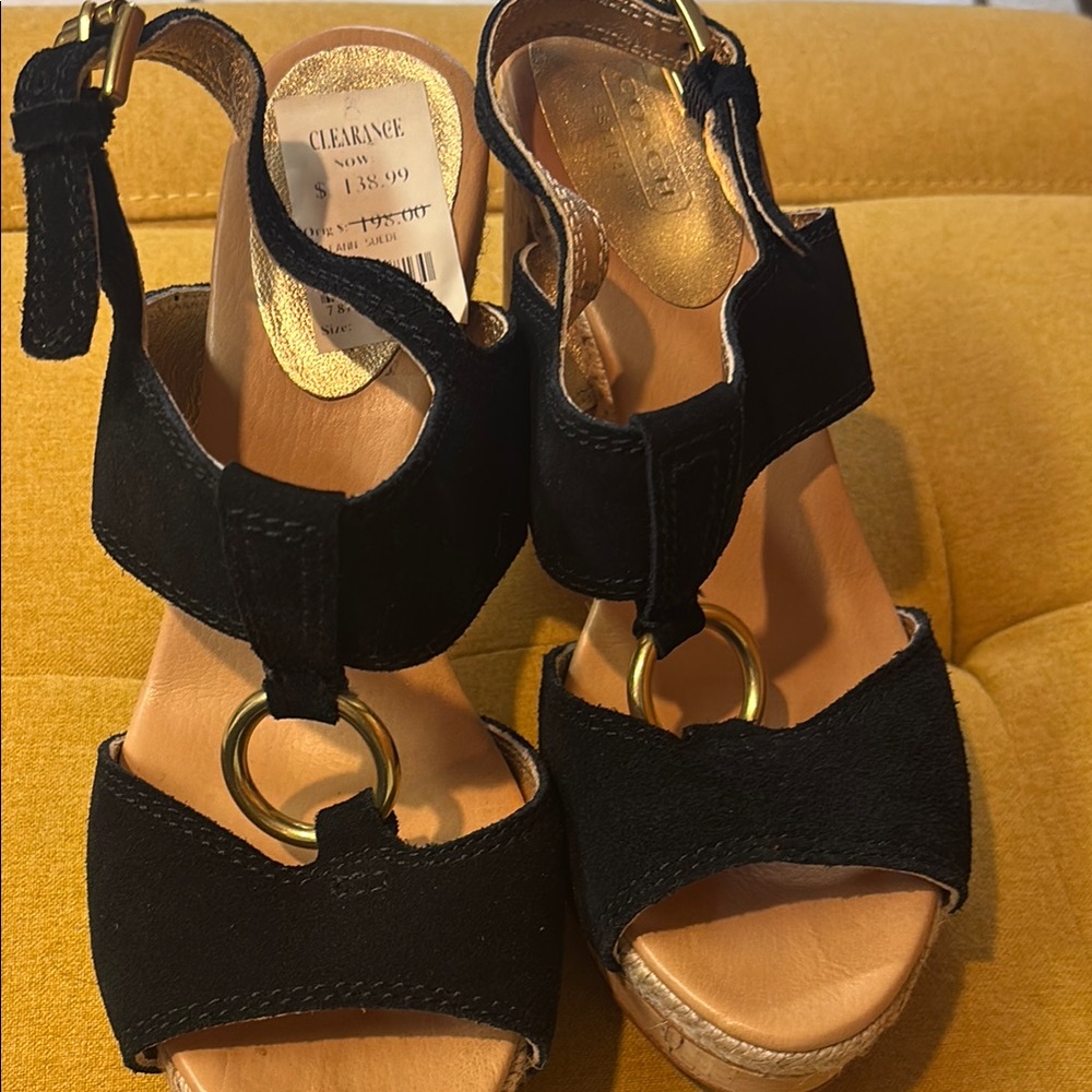 Coach Black Wedge Sandals with gold buckles . New condition size 8